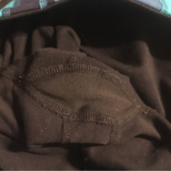 Size 4 Lululemon Black Capri Leggings with a waist band of shades of blue - Picture 4 of 10